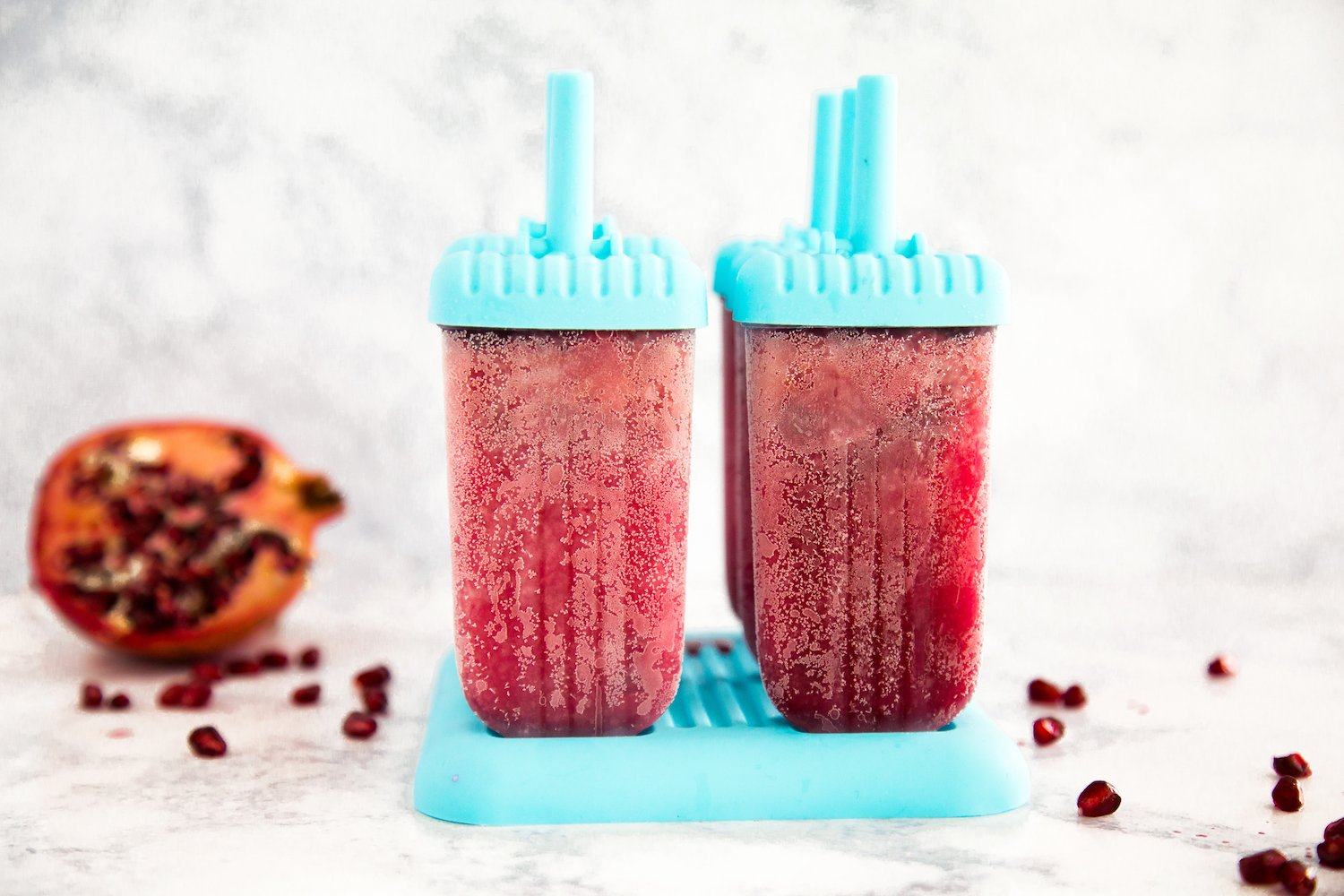 How to Make: Pomegranate-Orange Kombucha Popsicles