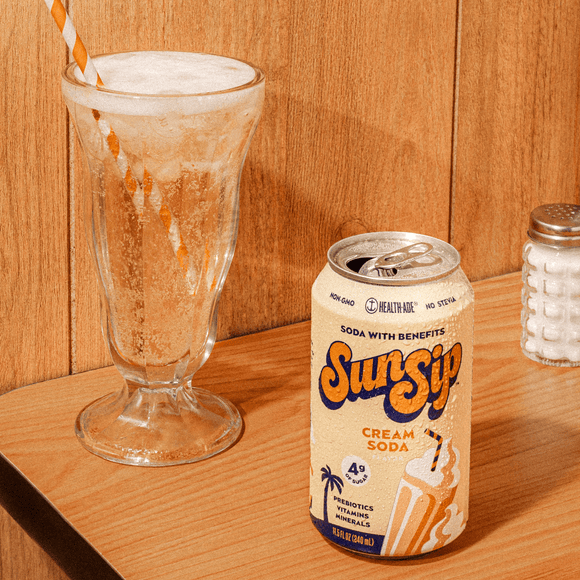 Cream Soda poured into a glass.  